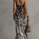 Vestido longo sexy com estampa animal e decote halter