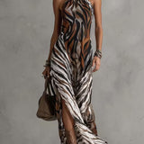 Vestido longo sexy com estampa animal e decote halter