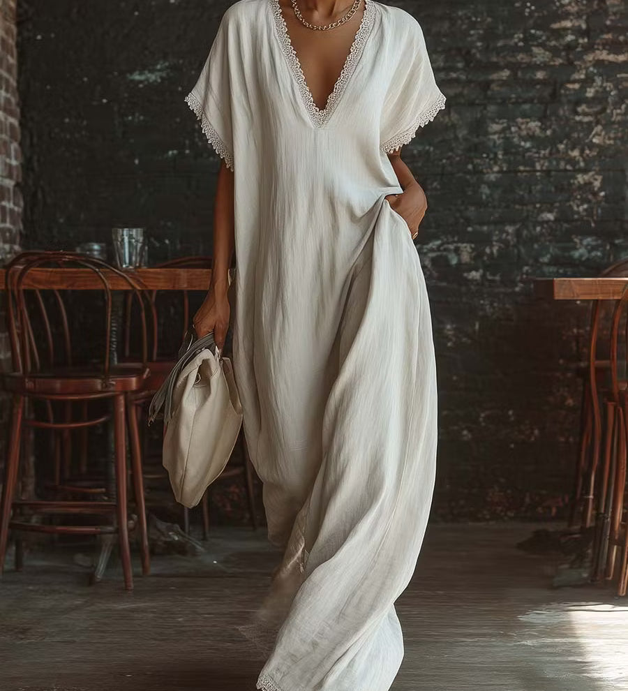 Vestido longo elegante e aconchegante em linho e algodão com detalhes em renda.