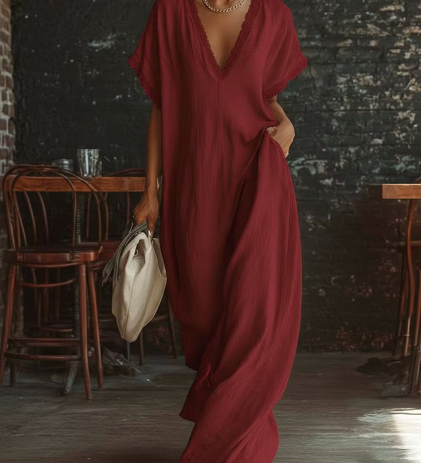 Vestido longo elegante e aconchegante em linho e algodão com detalhes em renda.