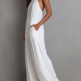 Macacão Resort Branco Plissado com Decote Halter e Pernas Largas