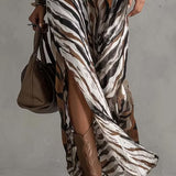 Vestido longo sexy com estampa animal e decote halter
