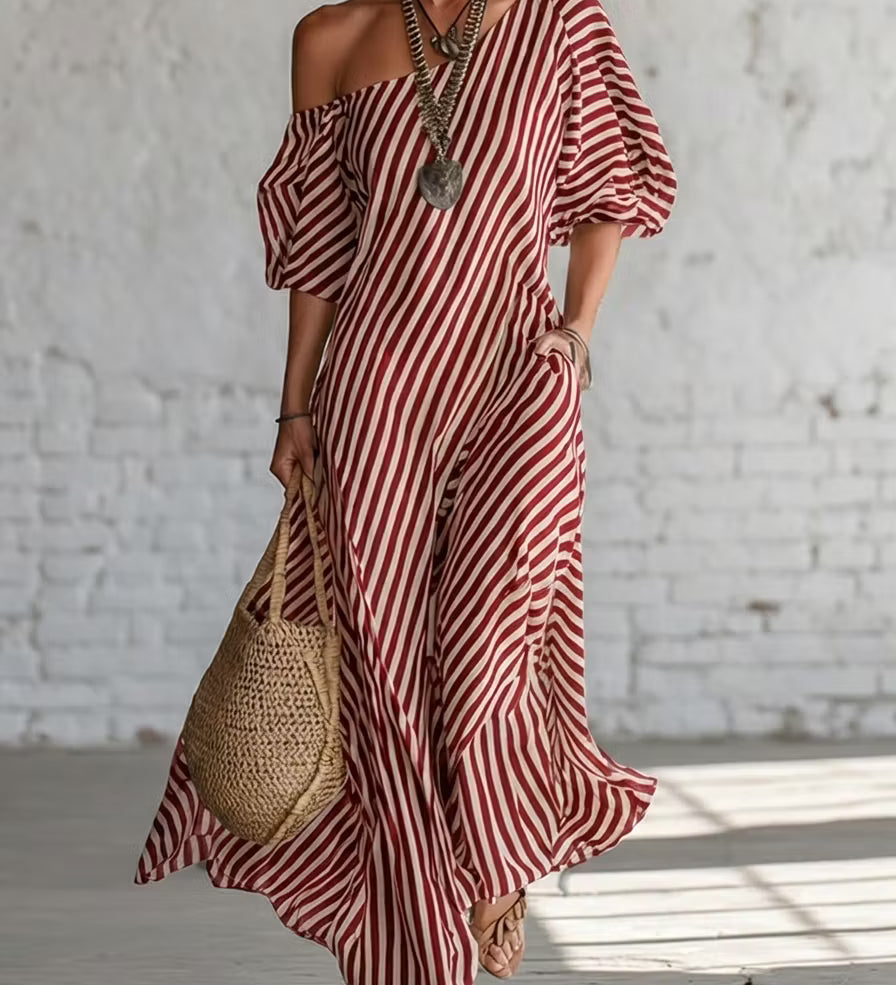 Vestido longo listrado elegante e clássico com ombros à mostra