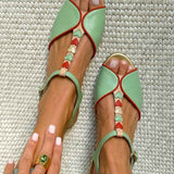 Sandálias slingback peep toe baixas com detalhe em coração