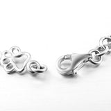 A pulseira «Laço Eterno» com patas e ossos