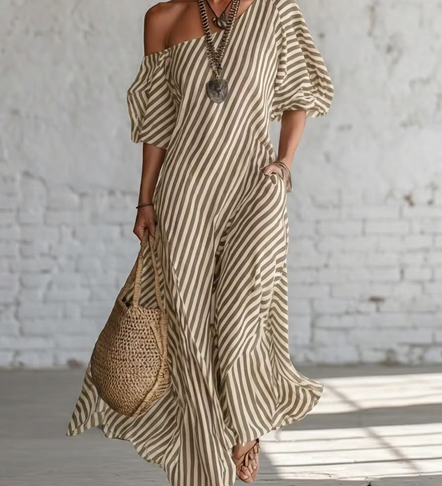 Vestido longo listrado elegante e clássico com ombros à mostra