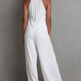 Macacão Resort Branco Plissado com Decote Halter e Pernas Largas