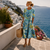 Elena | Vestido midi floral leve e fluido